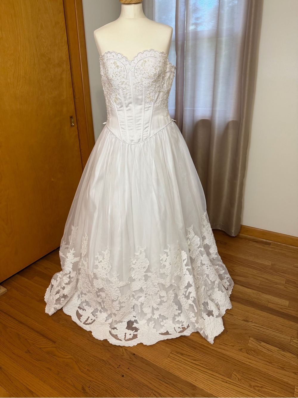 Vintage Mary’s white basque waist wedding dress.